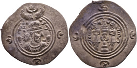 Khosrow II (591-628) Drachm Obv: Bust of a king wearing a winged crown, turned to the right. Rev: Blazing altar of fire situated between two guards