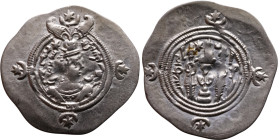 Khosrow II (591-628) Drachm Obv: Bust of a king wearing a winged crown, turned to the right. Rev: Blazing altar of fire situated between two guards