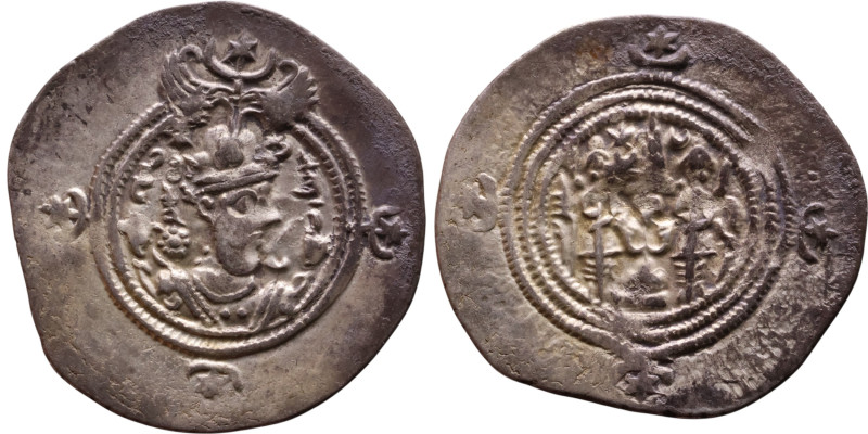 Khosrow II (591-628) Drachm Obv: Bust of a king wearing a winged crown, turned t...