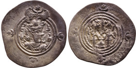 Khosrow II (591-628) Drachm Obv: Bust of a king wearing a winged crown, turned to the right. Rev: Blazing altar of fire situated between two guards