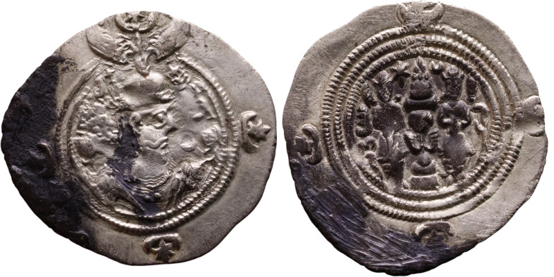 Khosrow II (591-628) Drachm Obv: Bust of a king wearing a winged crown, turned t...