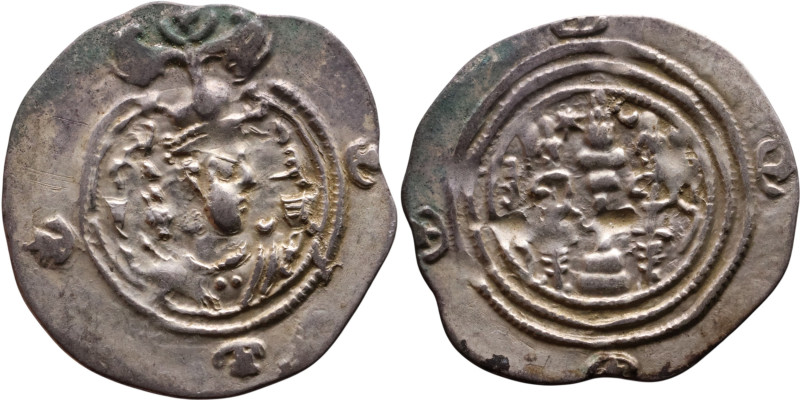 Khosrow II (591-628) Drachm Obv: Bust of a king wearing a winged crown, turned t...