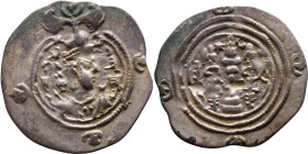 Khosrow II (591-628) Drachm Obv: Bust of a king wearing a winged crown, turned to the right. Rev: Blazing altar of fire situated between two guards