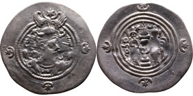 Khosrow II (591-628) Drachm Obv: Bust of a king wearing a winged crown, turned to the right. Rev: Blazing altar of fire situated between two guards