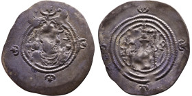Khosrow II (591-628) Drachm Obv: Bust of a king wearing a winged crown, turned to the right. Rev: Blazing altar of fire situated between two guards