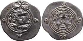 Khosrow II (591-628) Drachm Obv: Bust of a king wearing a winged crown, turned to the right. Rev: Blazing altar of fire situated between two guards