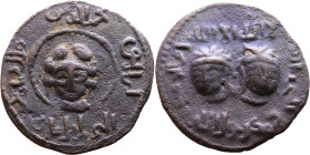 Seljuk (1037–1157, Bronze coin in Antiqe style. Obverse: Bust Reverse: Arabic inscription