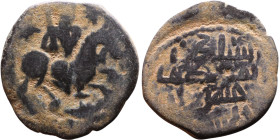 Seljuk (1037–1157) Bronze coin. Obverse: Arabic inscription. Reverse: Arabic inscription
