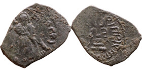 al-Malik ibn Marwan (687-705) Follis. Obverse: Standing caliph Reverse: Modified cross potent set on steps
