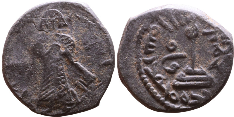 al-Malik ibn Marwan (687-705) Follis. Obverse: Standing caliph Reverse: Modified...