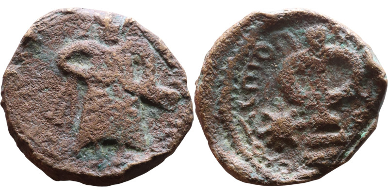 al-Malik ibn Marwan (687-705) Follis. Obverse: Standing caliph Reverse: Modified...