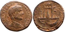 Caracalla (211-217) Koinon of Cyprus Bronze coin. Obv:  Laureate, draped bust of emperor. Rev: Temple of Aphrodite at Palaipaphos, in which canonical ...