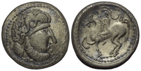 Ostkelten. Transsilvanien. Typ 'B-Reiter'.

 Tetradrachme (Silber). 2. Jhdt. v. Chr.
Vs: Stilisierter Kopf mit Lorbeerkranz rechts.
Rs: Stilisiert...