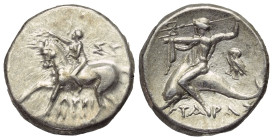 Kalabrien. Tarent.

 Didrachme oder Nomos (Silber). Ca. 272 - 240 v. Chr.
Vs: Nackter Jüngling zu Pferde mit erhobenem Arm nach links reitend; über...