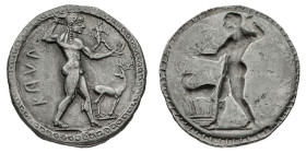 Monete Greche
Caulonia - Nomos databile al periodo 525-500 a.C. - Diritto: Apollo in cammino verso destra tiene un ramo di alloro con la mano destra ...