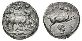 Monete Greche
Messana (Zancle) - Tetradramma databile al periodo 412-408 a.C. - Diritto: biga trainata da mule, coronate dalla Vittoria, in lento mov...