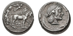Monete Greche
Siracusa - Periodo della Tirannia Dinomenide (485-466 a.C.) - Tetradramma databile al periodo 478-475 a.C. - Diritto: quadriga al passo...