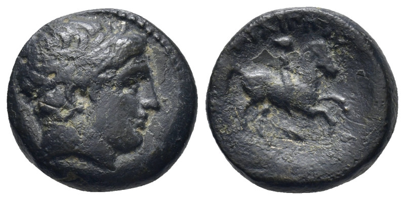 Macedonia, Philip II; 359-336 BC. AE (17mm, 5.6 g) Obv: Head of Apollo r. Rx: ΦΙ...