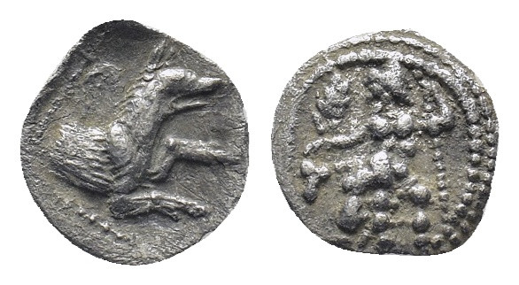 Lycaonia. Laranda 324-323 BC. Obol.AR (11mm, 0,53 g) Baaltars seated left, holdi...