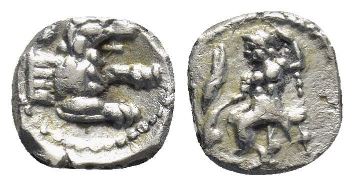 Lycaonia. Laranda 324-323 BC. Obol.AR (9mm, 0,51 g) Baaltars seated left, holdin...