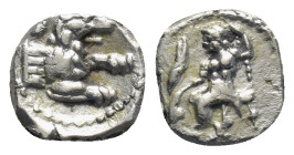 Lycaonia. Laranda 324-323 BC. Obol.AR (9mm, 0,51 g) Baaltars seated left, holding grain ear, grape bunch, and sceptre. Rev: Forepart of wolf right; in...