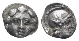 PISIDIA. Selge. Circa 350-300 B.C. AR obol. (10mm, 0.91 g). Gorgon head facing / Helmeted head of Athena right, astralagos behind.