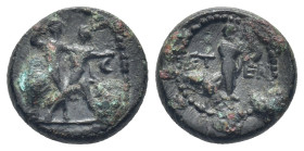 Pisidia, Etenna. AE. 1st century BC. (2.3 Gr. 13mm.)
Two men standing facing, fighting with a double-axe and a curved knife.
 Rev. Nymph advancing to ...
