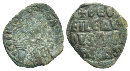 THEOPHILUS. 830-842 AD. Constantinople mint.AE Follis. (29mm, 6.7 g) ThEOFIL bASIL, crowned, three-quarter length figure of Theophilus facing, pellets...