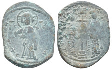 Constantine X Ducas and Eudocia AD 1059-1067. Constantinople Follis Æ (30mm, 8.7 g). +EMMANOVHΛ; Christ standing facing on footstool, wearing nimbus a...