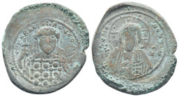 Constantine X Ducas, AD 1059-1067. AE, Follis. (31mm, 11.8 g). Constantinople. Obv: +EMMA NOVHA / IC XC. Bust of Christ facing, wearing nimbus cross, ...