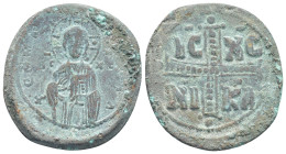 Anonymous (1034-1041 AD) Constantinople AE Follis (29mm, 8,9 g) Obv: ЄmmANOVHA, IC-XC, three-quarter length figure of Christ standing facing, wearing ...