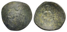 MANUEL I.1160-1164 AD. Constantinople mint.AE Trachy. (25mm, 2.9 g) MP-ΘV to left and right of Mary, nimbate, seated facing on throne without back, ho...