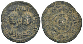 Artuqids (Mardin). Najm al-Din Alpi AD 1152-1176. AH 547-572. Struck AH 560-566 (AD 1164-1170). Dirhem Æ (31mm, 14,0 g). Two diademed and draped male ...