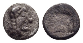 THRACO-MACEDONIAN TRIBES. Uncertain. Hemiobol (circa 520-500 BC).

Obv: Head of satyr right.
Rev: Quadripartite incuse square.

cf. CNG E-299.

Condit...