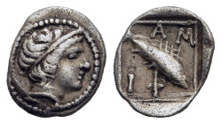 MACEDON. Amphipolis. Obol (circa 357-353 BC).

Obv: Male head right, wearing tainia.
Rev: AMΦI.
Grouper right within incuse lozenge.

SNG ANS 83-4; HG...