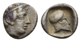 MACEDON. Skione. Hemiobol (circa 424-410 BC).

Obv: Head of youthful Protesilaos to right, wearing tainia.
Rev: Corinthian helmet to right; all within...