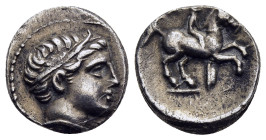 KINGS OF MACEDON. Philip II (359-336 BC). 1/5 Tetradrachm. Amphipolis.

Obv: Diademed head of Apollo right.
Rev: ΦIΛIΠΠOY.
Youth on horseback right; b...