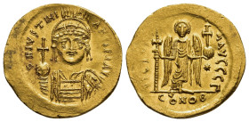 JUSTINIAN I (527-565). GOLD Solidus. Constantinople.

Obv: D N IVSTINIANVS P P AVG.
Helmeted and cuirassed bust facing, holding globus cruciger and sh...