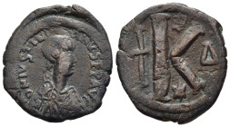 JUSTINIAN I (527-565). Half Follis. Constantinople.

Obv: D N IVSTINIANVS PP AVG.
Diademed, draped and cuirassed bust right.
Rev: Large K; cross to le...