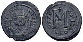 JUSTINIAN I (527-565). Follis. Nicomedia. Dated RY 29 (555/6).

Obv: D N IVSTINIANVS P P AVG.
Helmeted and cuirassed bust facing, holding globus cruci...