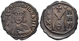 THEOPHILUS (829-842). Follis. Constantinople.

Obv: ✷ ΘЄOFIL ЬASIL.
Crowned and draped bust facing, holding patriarchal cross and akakia.
Rev: Large M...