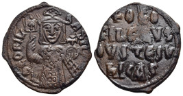 THEOPHILUS (829-842). Follis. Constantinople.

Obv: ΘЄOFIL' ЬASIL'.
Facing bust, holding labarum and globus cruciger, and wearing crown surmounted by ...