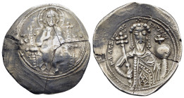 ALEXIUS I COMNENUS (1081-1118). Pale Electrum Trachy. Constantinople.

Obv: Christ nimbate, seated facing on throne with curved back, wearing tunic an...