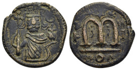 ISLAMIC. Umayyad Caliphate. AE Fals (circa AD 680-700/10). ‘Pseudo-Damascus’ mint, probably in northern Jordan or Palestine. 

Obv: Standing imperial ...