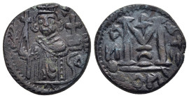 ISLAMIC. Umayyads. Arab- Byzantine types. AE Fals (ca. AD 660- 680). Damascus mint.

Obv: Byzantine style standing emperor, holding long cross and glo...