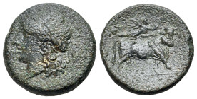 Italy. Campania, Neapolis, 250-225 BC. Æ (20mm, 6.83g., 6h). Laureate head of Apollo l. R/ Man-headed bull walking r.; above, Nike flying r., placing ...