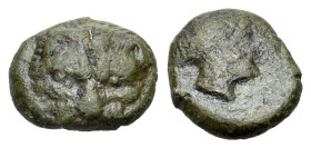 Italy. Bruttium, Rhegion, c. 415-387 BC. Æ (11mm, 1.63g., 3h). Lion’s head facing / Laureate head of Apollo r. HNItaly 2524; HGC 1, 1701.