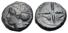Sicily, Syracuse, c. 415-405 BC. Æ Hemilitron (14mm, 3.71g., 3h14mm, 3.71g., 3h). Head of Arethusa l., hair in sphendone. R/ Wheel of four spokes; dol...