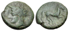 Carthaginian Domain, Sicily, c. 375-350 BC. Æ (15mm, 3.22g., 6h). Wreathed head of Tanit l. R/ Horse prancing r. MAA 15a; SNG Copenhagen 97; CNS III, ...