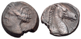 North Africa, Carthage, Æ (18mm, 5.03g.,12h). Sardinian(?) mint, c. 300-264 BC. Wreathed head of Tanit l. / Head of horse r.; pellet below, large pell...